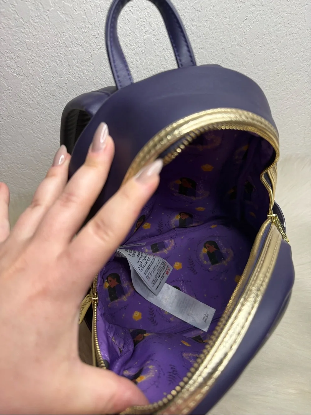 Loungefly Official Disney Parks Wish Asha and Star Mini Backpack